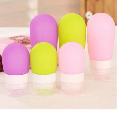 Wholesale custom purple squeeze tube lotion bottle 60ml travel silicone bottle set